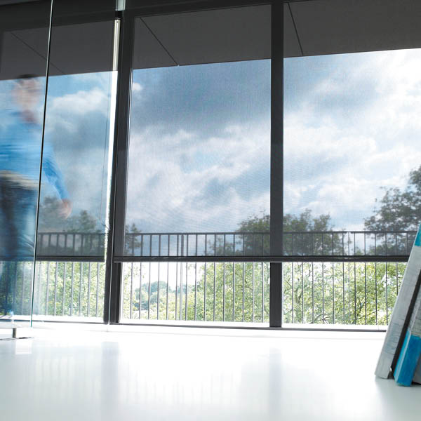 Roller window blinds from Shutterstyle in sheer charcoal fabric