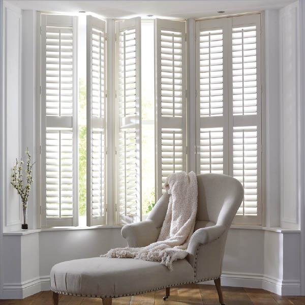 large full height shutters with sofa